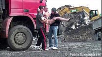 Cute blonde fucked by 2 guys at a public construction site threesome