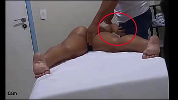 Hidden camera films client being masturbated by masseuse